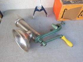Found an old picture of strainer we used to remove skin and seeds from tomatoes.